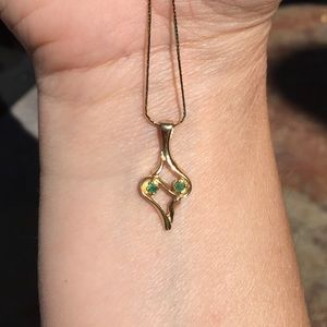 Lovely emerald pendant with 15.5” 14k gold chain